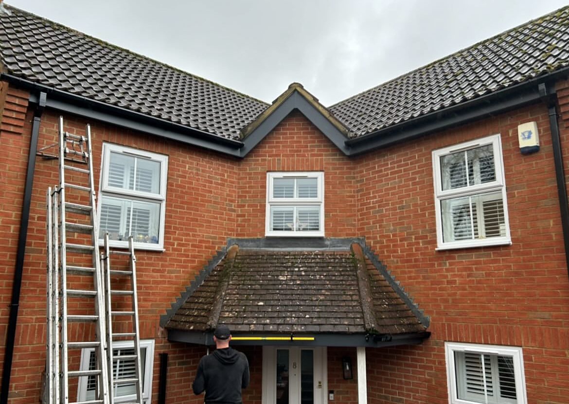 New guttering on a red brick house