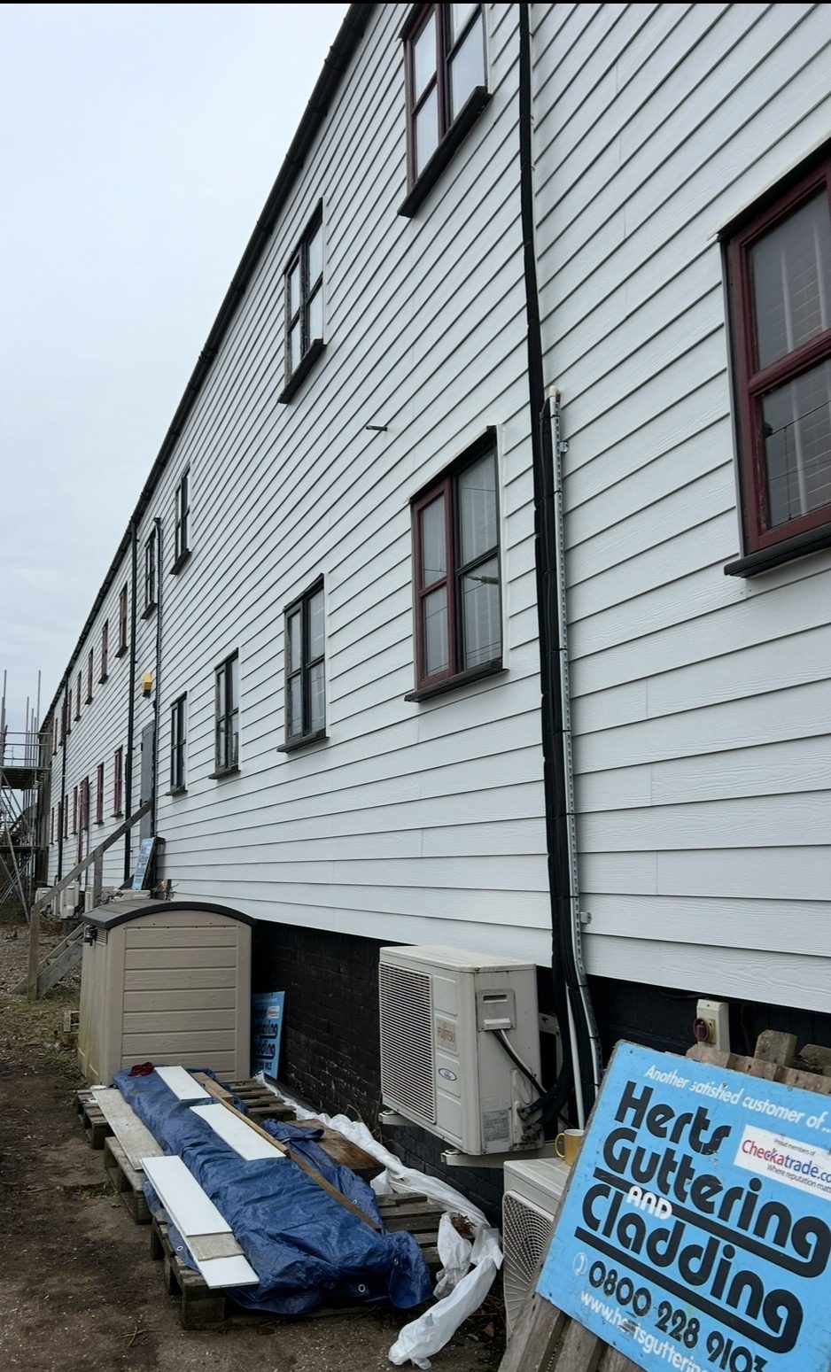 White UPVC cladding installation
