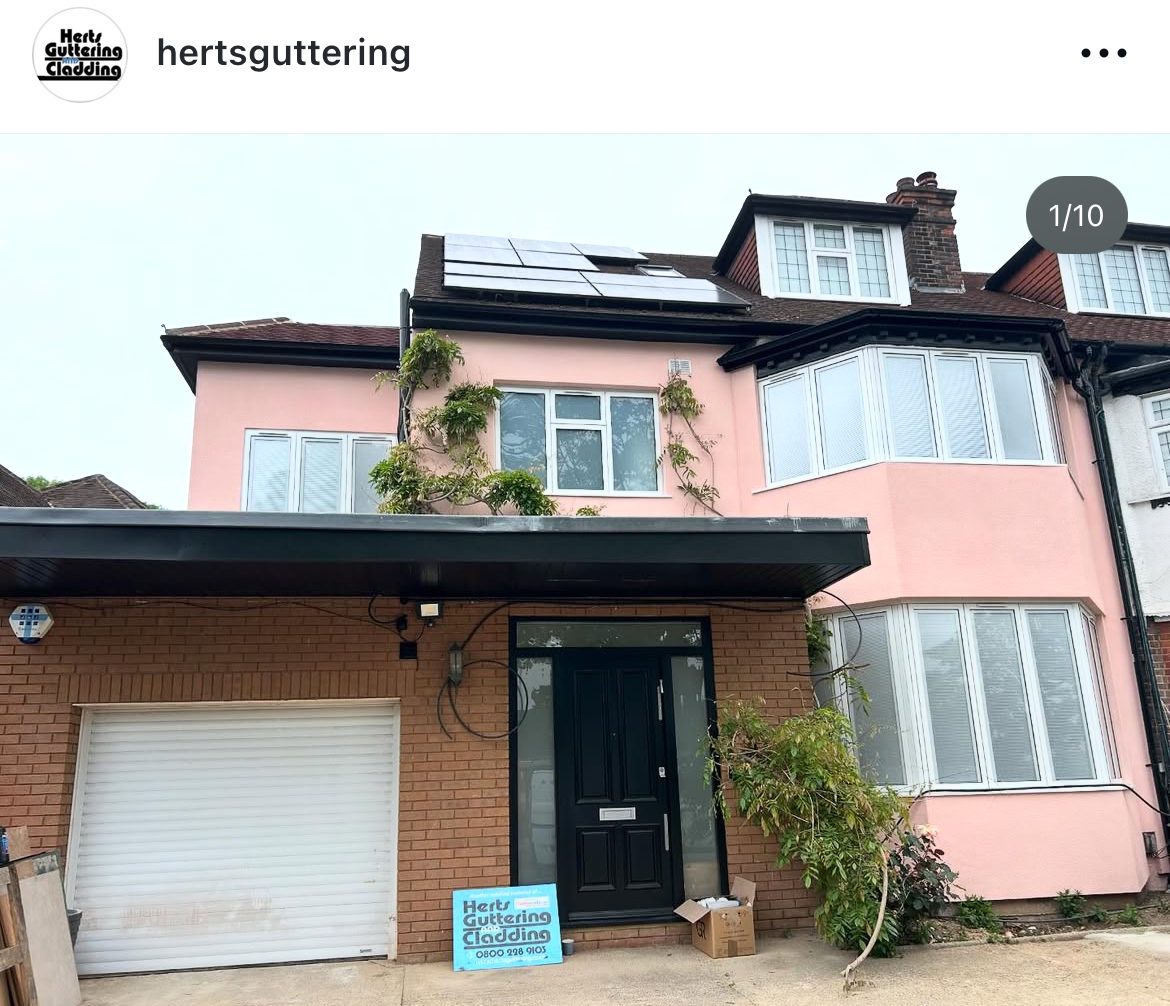House with new white fascia and garage