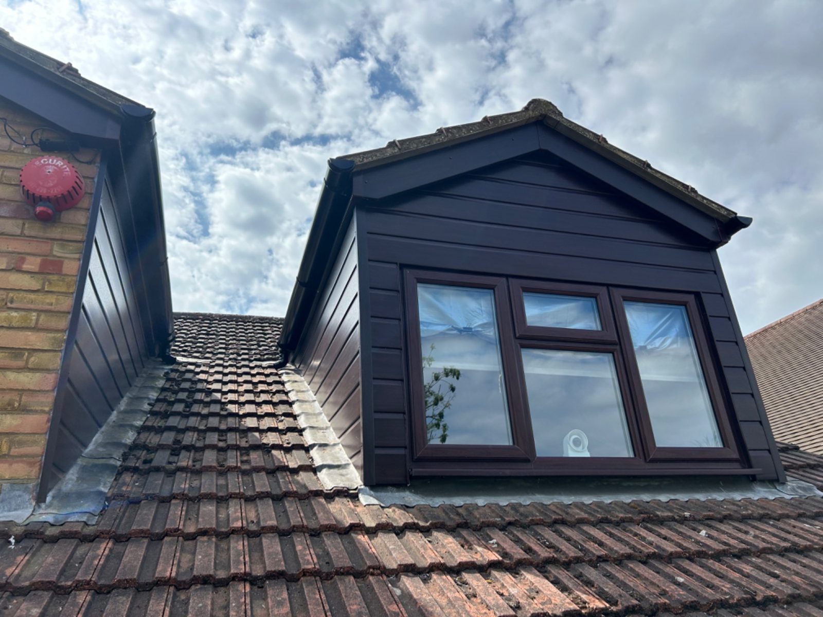Dormer roofline with new guttering